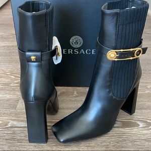 Beautiful Versace boots band new